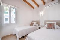 Postel nebo postele na pokoji v ubytování Villa Sol del Sur 15