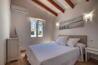 Postel nebo postele na pokoji v ubytování Villa Sol del Sur 15