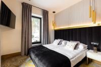 Posteľ alebo postele v izbe v ubytovaní Tatry Residence SPA