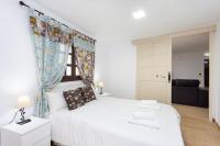 Postel nebo postele na pokoji v ubytování La Esperanza downtown 3 bd apt