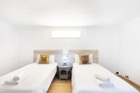 Postel nebo postele na pokoji v ubytování La Esperanza downtown 3 bd apt