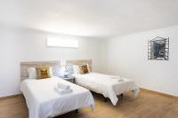 Postel nebo postele na pokoji v ubytování La Esperanza downtown 3 bd apt