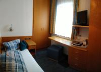 Łóżko lub łóżka w pokoju w obiekcie Fremdenpension Alpenruhe