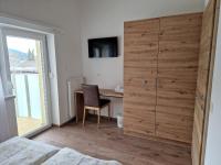 Televízia a/alebo spoločenská miestnosť v ubytovaní Appartement Sami