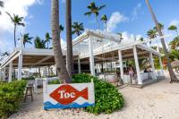 a resort with a too sign on the beach at Ocean Views & Private Beach! Luxury 4BDR Getaway in Punta Cana