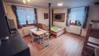 Postel nebo postele na pokoji v ubytování Apartmány Domino