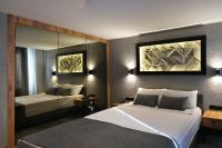 Cama ou camas em um quarto em Mielo Lara Hotel
