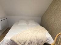 Posteľ alebo postele v izbe v ubytovaní Chambre chez Marjorie