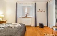 A bed or beds in a room at The Dolomiti View