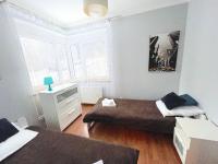Posteľ alebo postele v izbe v ubytovaní Apartamenty Superior Izery Cicha-Free Parking