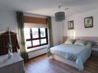Postel nebo postele na pokoji v ubytování Casa Rigo en Sigüeiro, cerca de Santiago de Compostela