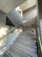 Televízia a/alebo spoločenská miestnosť v ubytovaní Airport Szálló