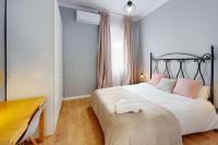Posteľ alebo postele v izbe v ubytovaní Bright flat Rosaleda