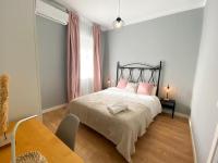 Posteľ alebo postele v izbe v ubytovaní Bright flat Rosaleda