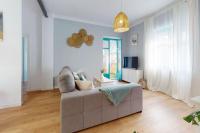 Televízia a/alebo spoločenská miestnosť v ubytovaní Bright flat Rosaleda