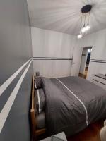 Łóżko lub łóżka w pokoju w obiekcie Kilomètre 99