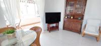 Televízia a/alebo spoločenská miestnosť v ubytovaní Apartamento Dianium by DENIA COSTA