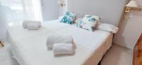 Posteľ alebo postele v izbe v ubytovaní Apartamento Dianium by DENIA COSTA