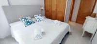 Posteľ alebo postele v izbe v ubytovaní Apartamento Dianium by DENIA COSTA