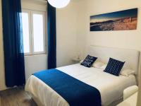 Posteľ alebo postele v izbe v ubytovaní Sunlight Málaga Centro