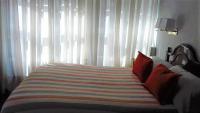 Posteľ alebo postele v izbe v ubytovaní Hostal Hispano