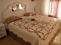 Postel nebo postele na pokoji v ubytování El Malecon B&B Hotel