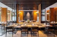 En restaurant eller et andet spisested på Villa Deva Resort & Hotel Bangkok