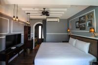 Postel nebo postele na pokoji v ubytování The Quba Boutique Hotel Pattaya