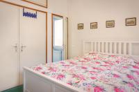 A bed or beds in a room at Villa Belvedere-Con piscina a Bardolino