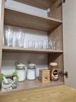 Kuchyňa alebo kuchynka v ubytovaní Apartament Słoneczny -Ściegiennego (garaż, centrum)