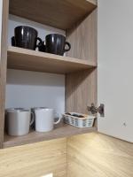 Kuchyňa alebo kuchynka v ubytovaní Apartament Słoneczny -Ściegiennego (garaż, centrum)