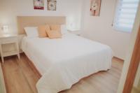 Posteľ alebo postele v izbe v ubytovaní Bonito apartamento con piscina.