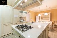 a kitchen with a stove and a counter top at Spacious NUM1 house in Swieqi - Sleeps 18 w&#47;WIFI by 360 Estates in Is-Swieqi
