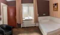Posteľ alebo postele v izbe v ubytovaní Hotel Goldene Spinne