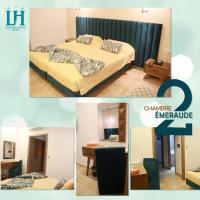 Postel nebo postele na pokoji v ubytování Larimar Hôtel Sfax