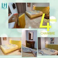 Postel nebo postele na pokoji v ubytování Larimar Hôtel Sfax