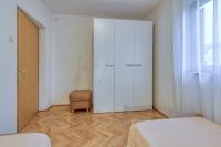 Posteľ alebo postele v izbe v ubytovaní Apartment Ana Coki
