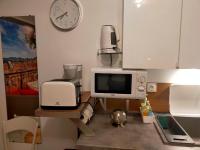 Kuchyňa alebo kuchynka v ubytovaní GREEN GARDEN cosy home WIFI