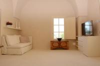 A television and/or entertainment centre at Casina Fontana Bed & Breakfast