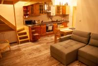 Kuchyňa alebo kuchynka v ubytovaní Western apartman