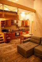 Kuchyňa alebo kuchynka v ubytovaní Western apartman