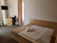 Postel nebo postele na pokoji v ubytování Hotel Mida