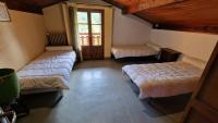 Posteľ alebo postele v izbe v ubytovaní Chalet l'Acinos