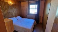 Posteľ alebo postele v izbe v ubytovaní Chalet l'Acinos