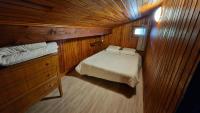 Posteľ alebo postele v izbe v ubytovaní Chalet l'Acinos