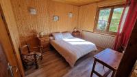Posteľ alebo postele v izbe v ubytovaní Chalet l'Acinos