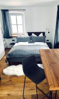 A bed or beds in a room at Chalet Badberg