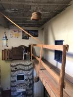 Lliteres en una habitació de Gite La belle vue Timichi