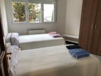 A bed or beds in a room at Luxury Apartment in Moncloa-Aravaca