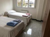 A bed or beds in a room at Luxury Apartment in Moncloa-Aravaca